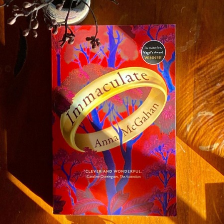 The novel Immaculate was authored by Anna McGahan.